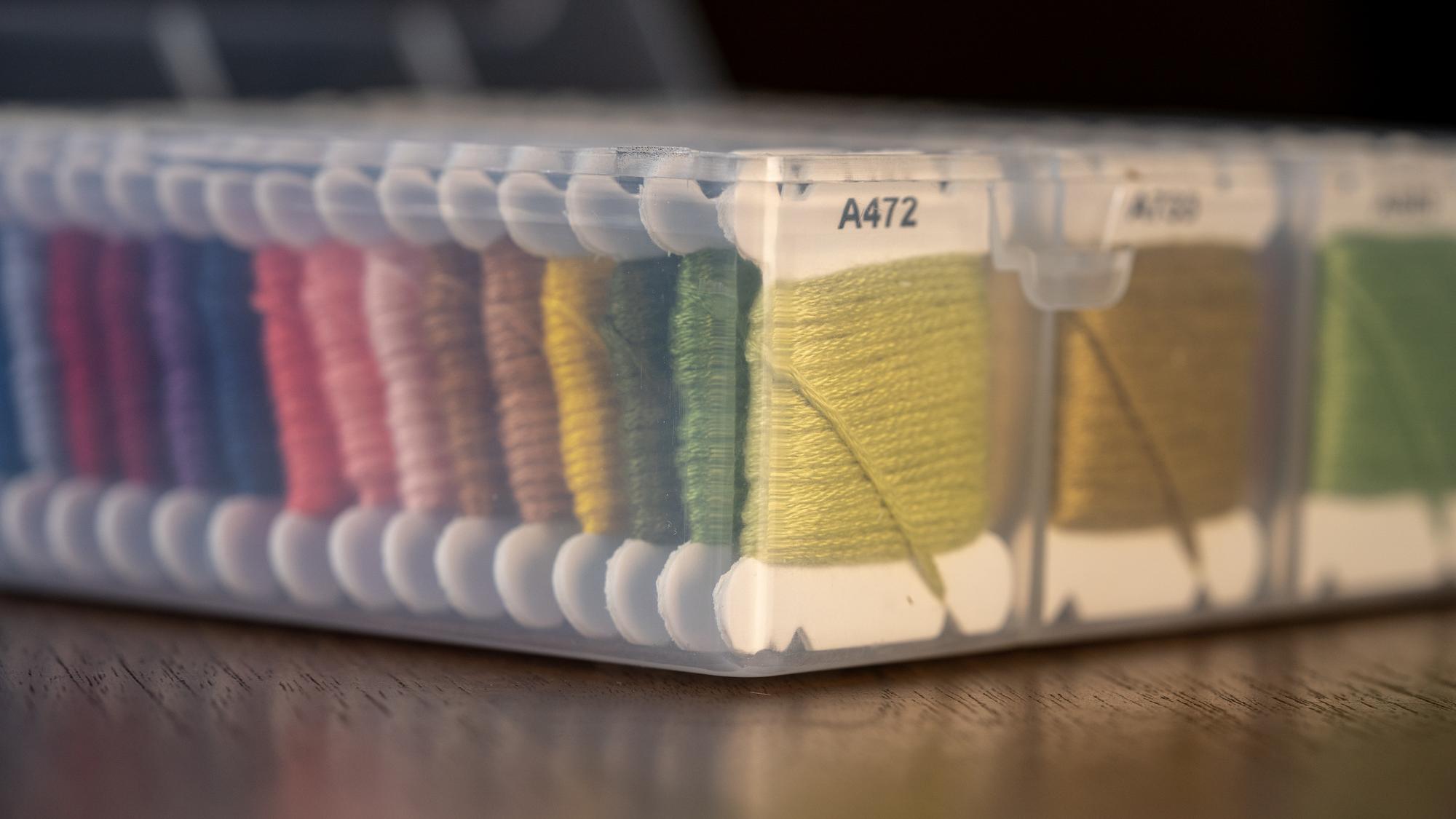sample pricing embroidery swatches on table